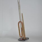 Conjunto brida termo eléctrico Junkers 8738711068
